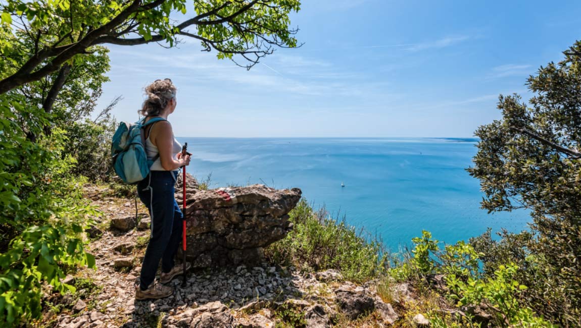 Hiker on a trail in Halkidiki with panoramic sea views