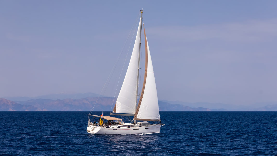 Sailing boat from Thessaloniki at sea near Halkidiki coast.